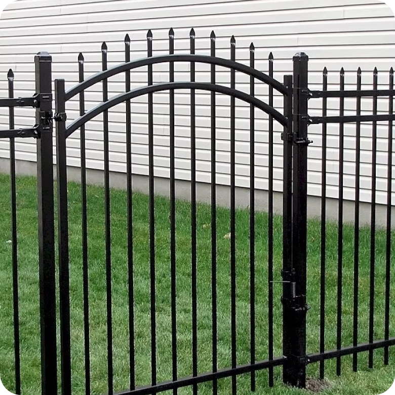 Black ornamental aluminum fence with an arched gate and spear-point finials.
